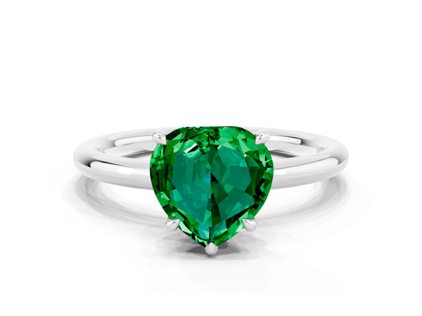 Silver Heart Cut Emerald Solitaire Ring with Thin Band and Four-Prong Setting