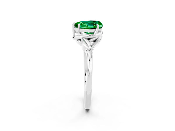 White gold Heart Cut Emerald Solitaire Ring with Twist Band and Four-Prong Setting