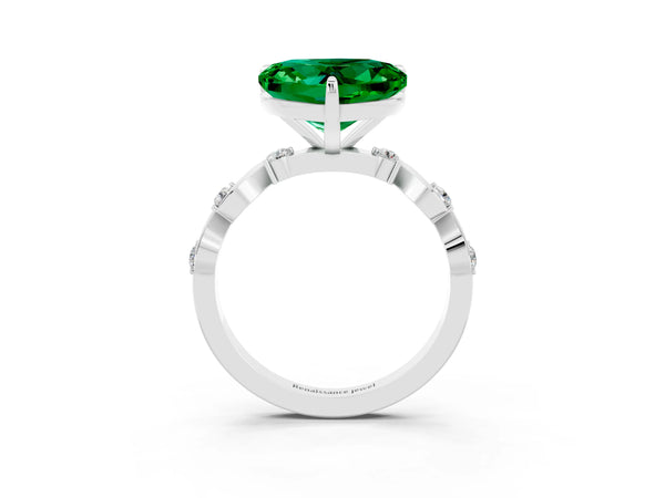 Platinum Heart Cut Emerald Solitaire Twisted Band with Round  Accents and Prong Setting