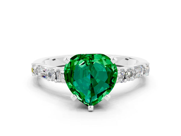 White gold Heart Cut Emerald Solitaire with Side Baguettes and Channel Set Band