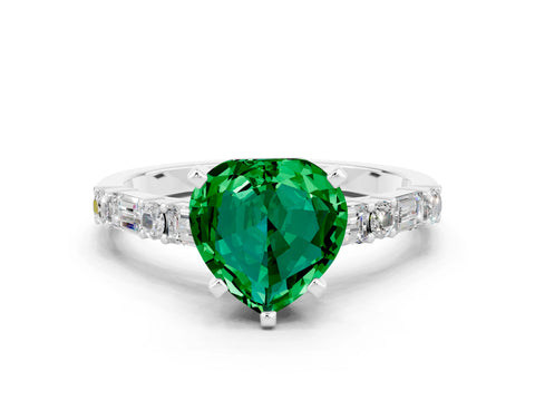 White gold Heart Cut Emerald Solitaire with Side Baguettes and Channel Set Band
