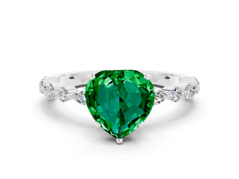 White gold Heart Cut Emerald Solitaire with Side Stones on a Pavé Band and Four-Prong Setting