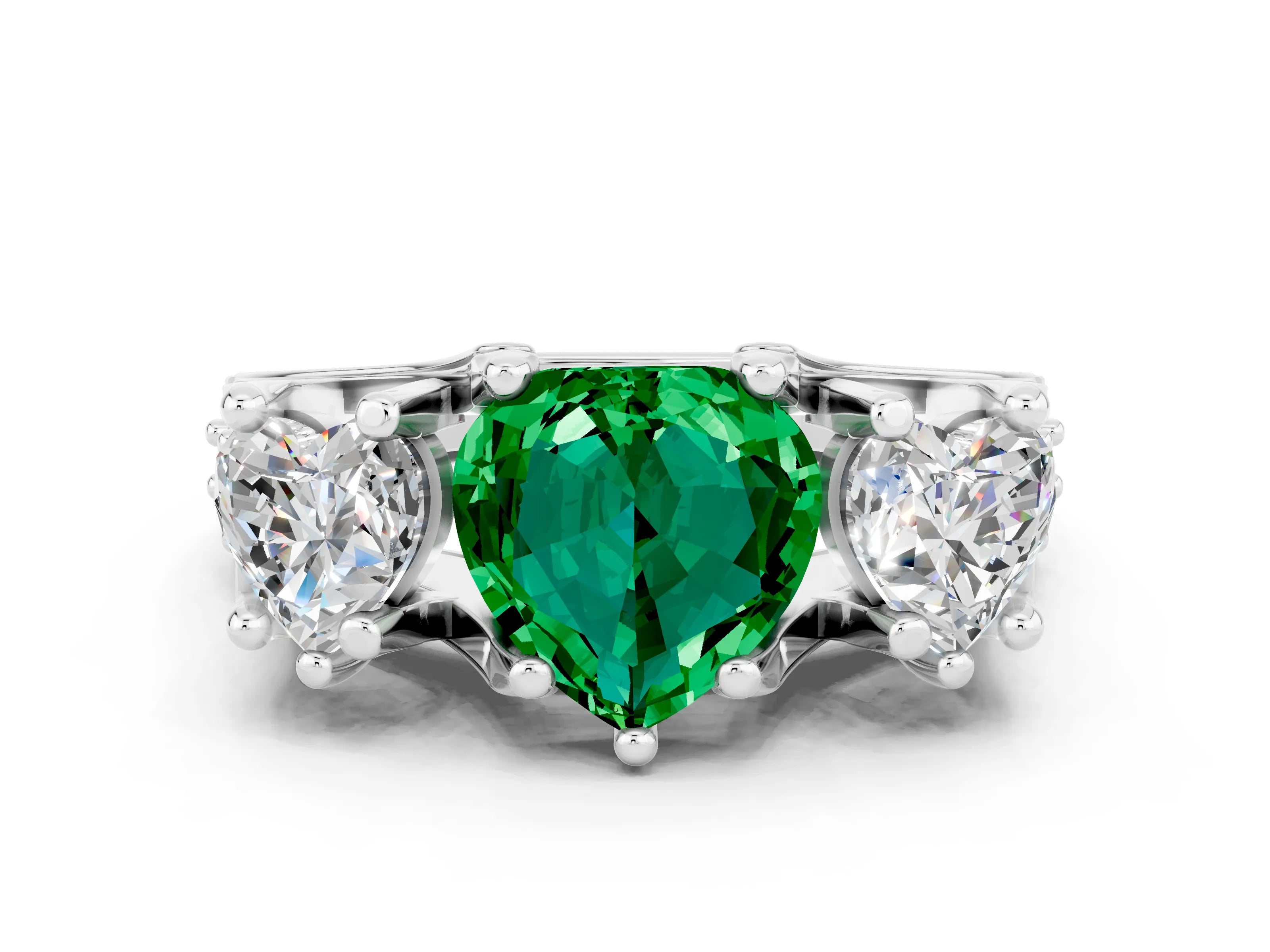 White gold Heart Cut Emerald Three-Stone Ring with Channel Set Band and Four-Prong Setting