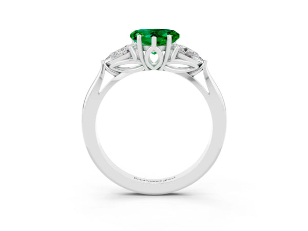 Platinum Heart Cut Emerald Three-Stone Ring with Pear  Side Stones and Prong Setting