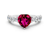 White gold Heart Cut Garnet Prong Setting with Side Stones on a Pave Band