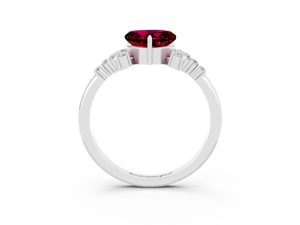White gold Heart Cut Garnet Ring with Side Stones and Four-Prong Setting