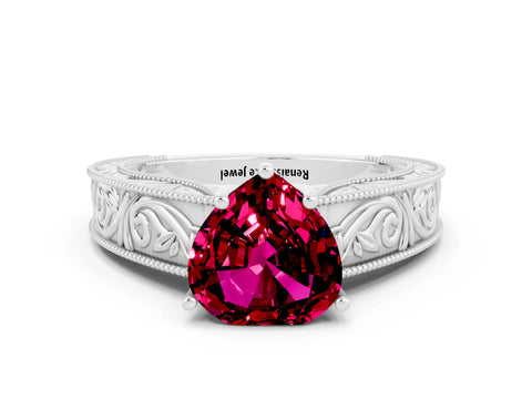White gold Heart Cut Garnet Solitaire Ring with Engraved Band and Four-Prong Setting