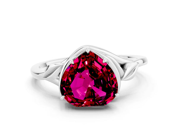 White gold Heart Cut Garnet Solitaire Ring with Twist Band and Four-Prong Setting