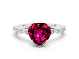 White gold Heart Cut Garnet Solitaire with Side Stones on a Pavé Band and Four-Prong Setting