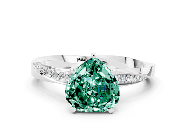 Platinum Heart Cut Green Sapphire Engagement Ring with Side Stone Accents and Four-Prong Setting