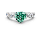 White gold Heart Cut Green Sapphire Prong Setting with Side Stones on a Pave Band
