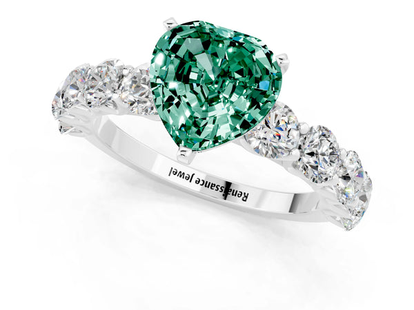 Platinum Heart Cut Green Sapphire Prong Setting with Side Stones on a Pave Band