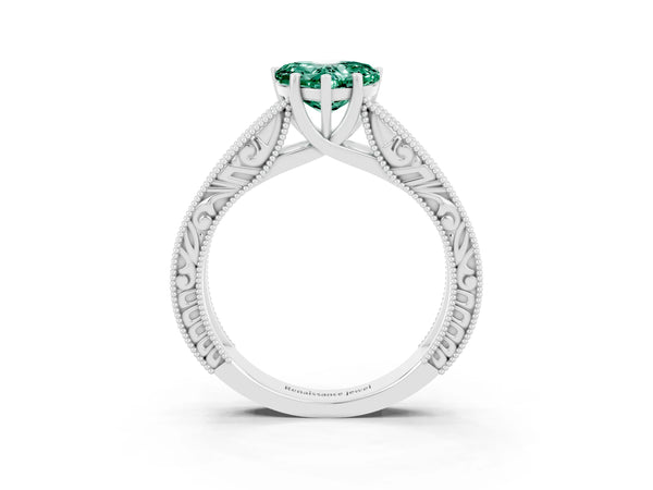 Platinum Heart Cut Green Sapphire Solitaire Ring with Engraved Band and Four-Prong Setting