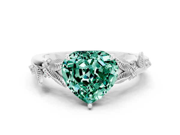 Silver Heart Cut Green Sapphire Solitaire Ring with Leaf Motif Band and Four-Prong Setting