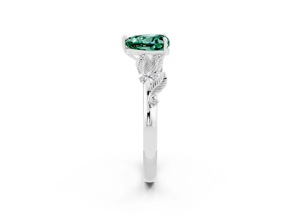Platinum Heart Cut Green Sapphire Solitaire Ring with Leaf Motif Band and Four-Prong Setting