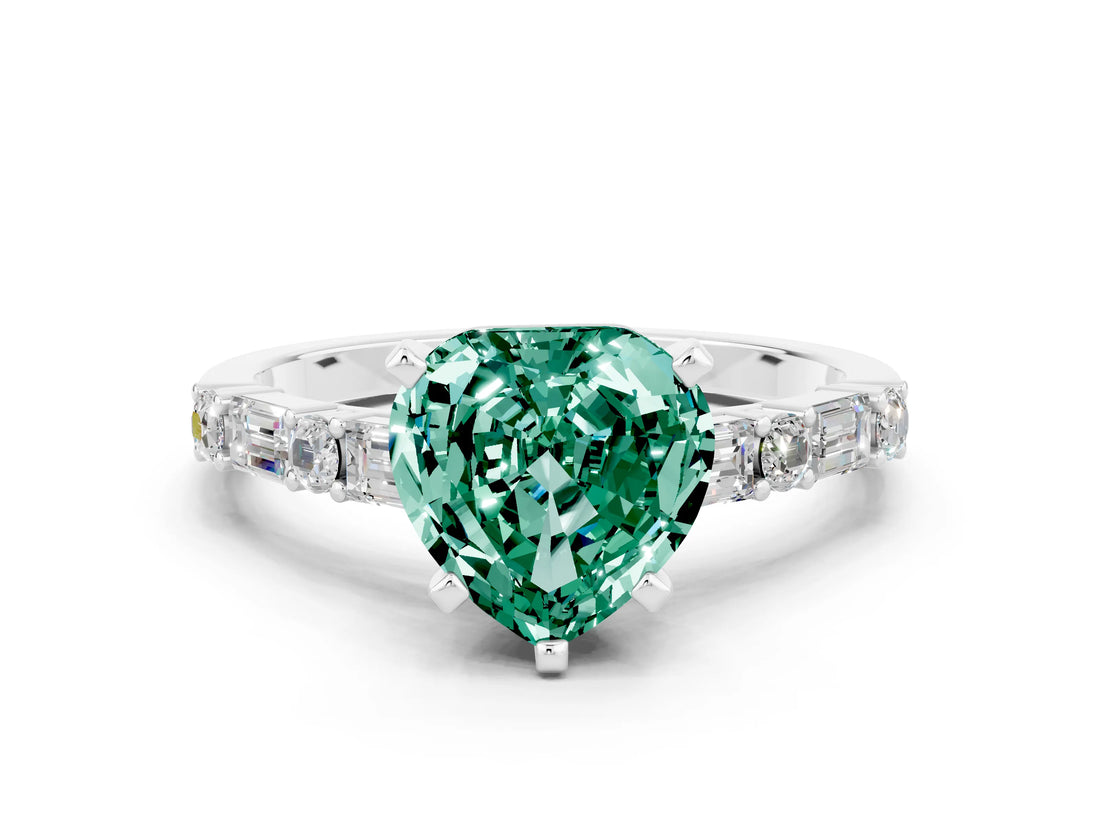 White gold Heart Cut Green Sapphire Solitaire with Side Baguettes and Channel Set Band