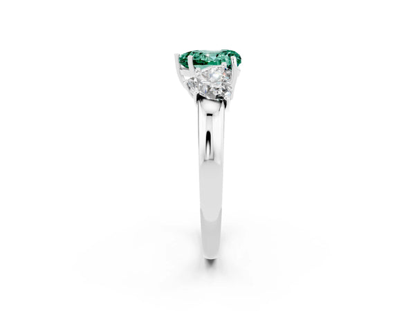 Platinum Heart Cut Green Sapphire Three-Stone Ring with Four-Prong Setting and Classic Band