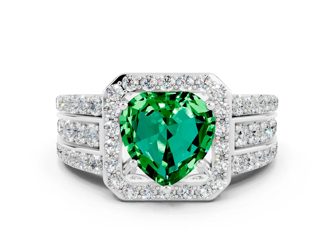 White gold Heart Cut Halo Emerald Ring with Split Shank and Four-Prong Setting
