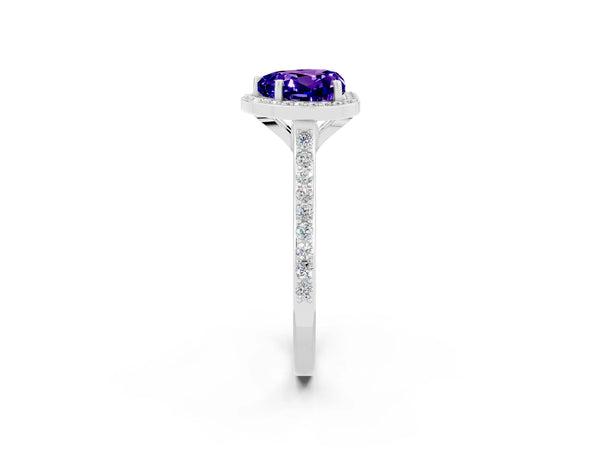 Platinum Heart Cut Tanzanite Halo Engagement Ring with Round Pavé Shoulders and Prong Setting
