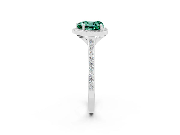 Platinum Heart Cut Green Sapphire Halo Engagement Ring with Round Pavé Shoulders and Prong Setting