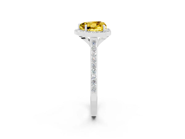 White gold Heart Cut Yellow Sapphire Halo Engagement Ring with Round Pavé Shoulders and Prong Setting