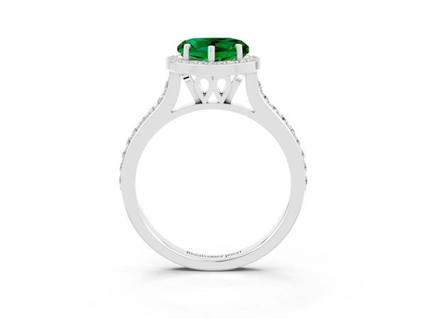 Platinum Heart Cut Emerald Halo Engagement Ring with Round Pavé Shoulders and Prong Setting