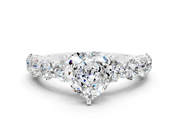 Platinum Heart Cut Moissanite Prong Setting with Side Stones on a Pave Band
