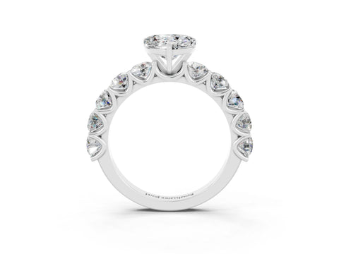 White gold Heart Cut Moissanite Prong Setting with Side Stones on a Pave Band_3