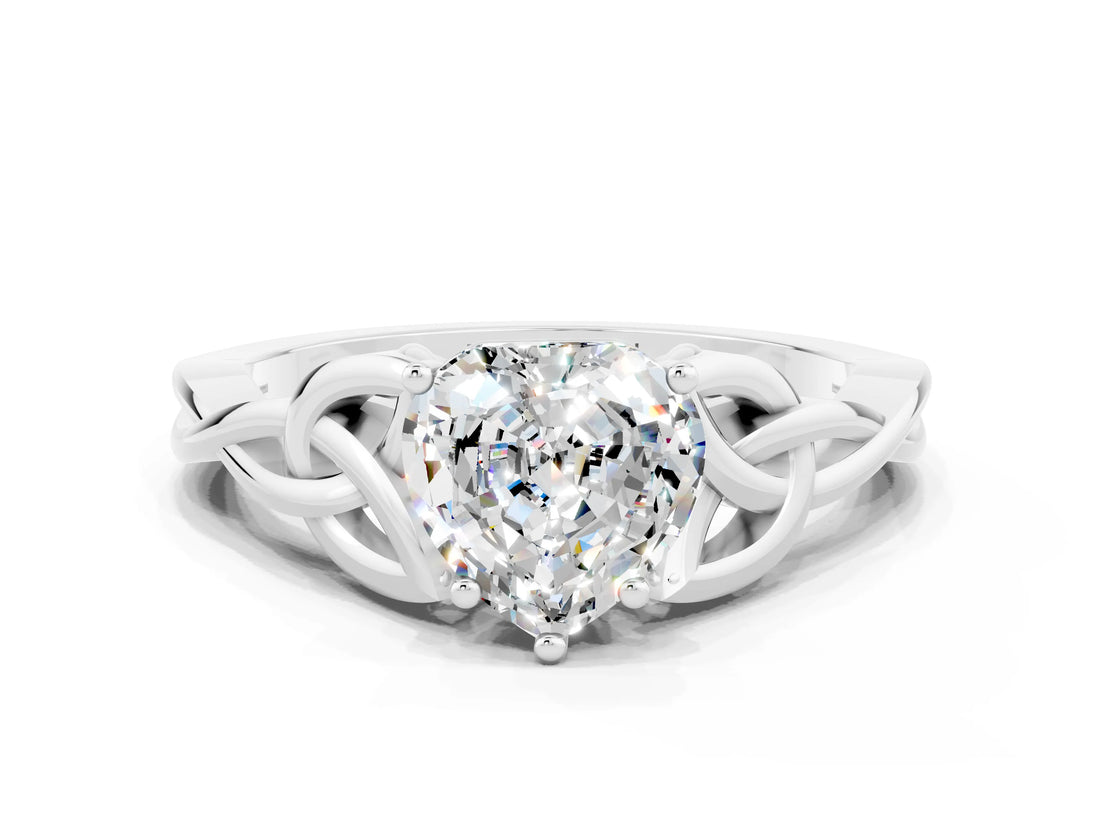 White gold Heart Cut Moissanite Solitaire Engagement Ring with Celtic Knot Band and Four-Prong Setting