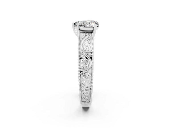 Silver Heart Cut Moissanite Solitaire Ring with Engraved Band and Four-Prong Setting