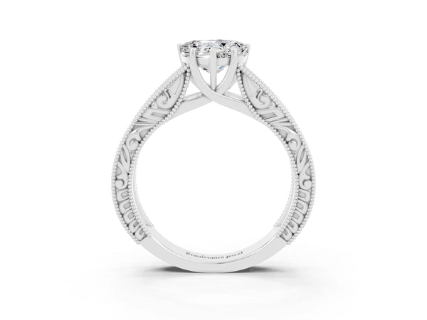 Platinum Heart Cut Moissanite Solitaire Ring with Engraved Band and Four-Prong Setting