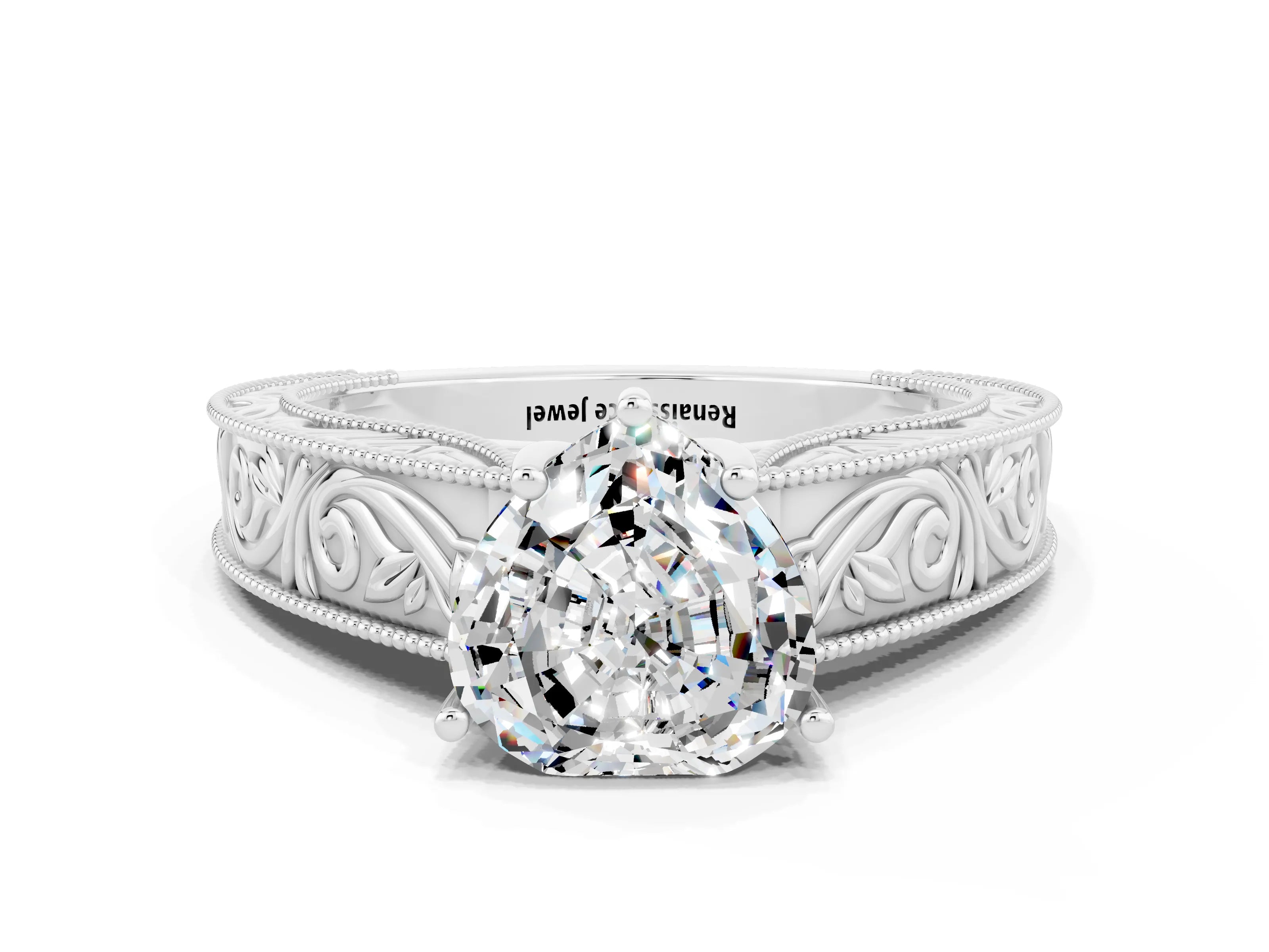 White gold Heart Cut Moissanite Solitaire Ring with Engraved Band and Four-Prong Setting