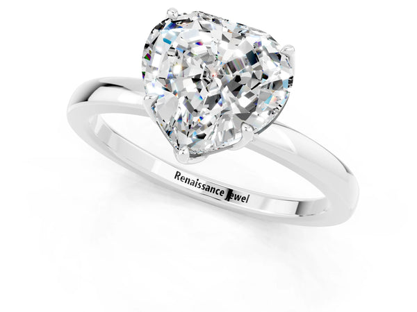 Platinum Heart Cut Moissanite Solitaire Ring with Thin Band and Prong Setting
