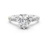 White gold Heart Cut Moissanite Solitaire with Side Baguettes and Channel Set Band