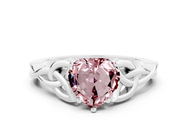 Platinum Heart Cut Morganite Solitaire Engagement Ring with Celtic Knot Band and Four-Prong Setting