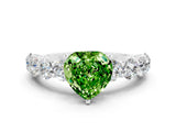 White gold Heart Cut Peridot Prong Setting with Side Stones on a Pave Band
