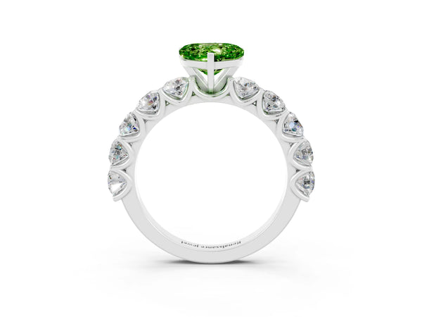 White gold Heart Cut Peridot Prong Setting with Side Stones on a Pave Band