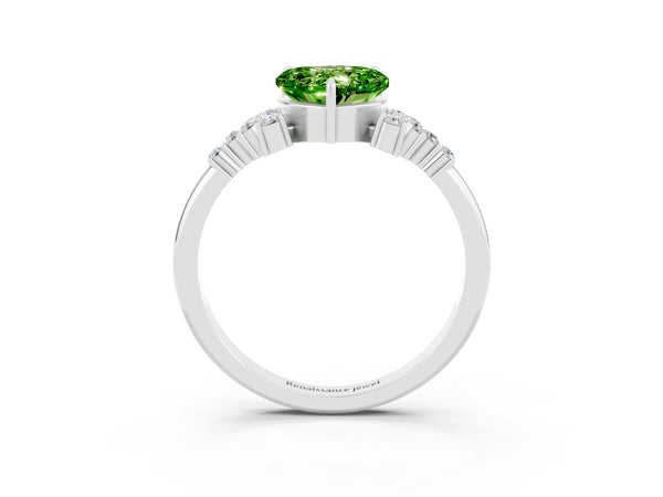 Silver Heart Cut Peridot Ring with Side Stones and Four-Prong Setting