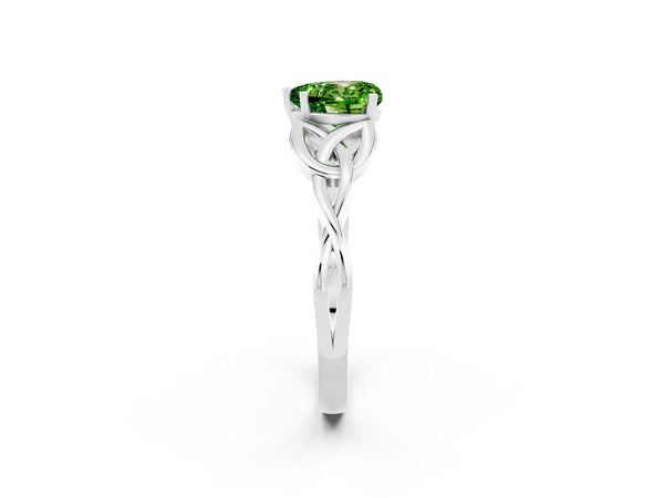 Platinum Heart Cut Peridot Solitaire Engagement Ring with Celtic Knot Band and Four-Prong Setting