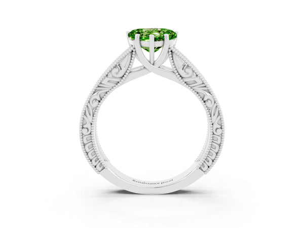 Silver Heart Cut Peridot Solitaire Ring with Engraved Band and Four-Prong Setting