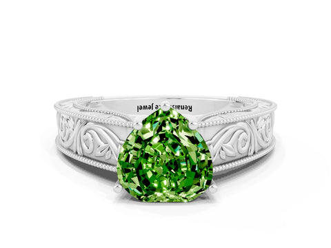 White gold Heart Cut Peridot Solitaire Ring with Engraved Band and Four-Prong Setting