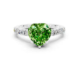 White gold Heart Cut Peridot Solitaire with Side Baguettes and Channel Set Band