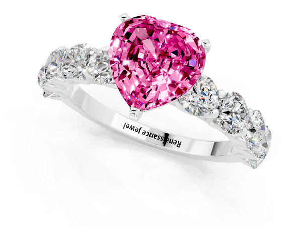 White gold Heart Cut Pink Sapphire Prong Setting with Side Stones on a Pave Band