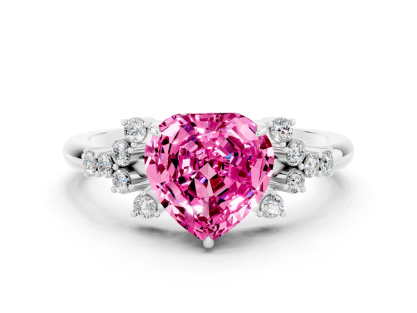 Platinum Heart Cut Pink Sapphire Ring with Side Stones and Four-Prong Setting