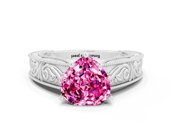 Platinum Heart Cut Pink Sapphire Solitaire Ring with Engraved Band and Four-Prong Setting