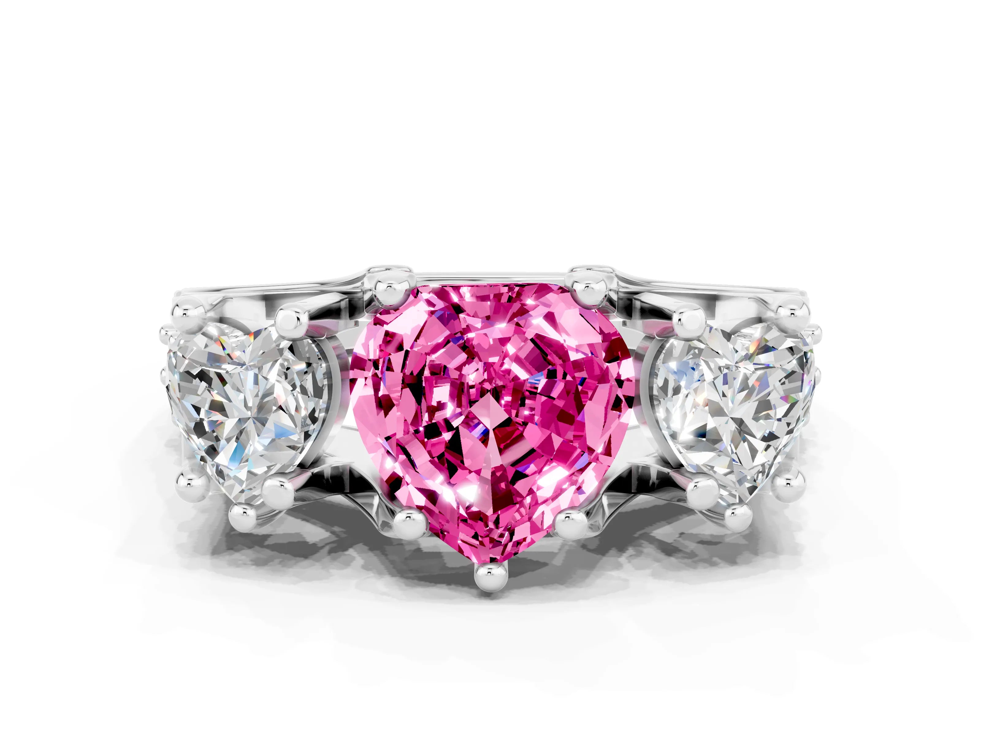 White gold Heart Cut Pink Sapphire Three-Stone Ring with Channel Set Band and Four-Prong Setting