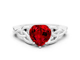 White gold Heart Cut Ruby Solitaire Engagement Ring with Celtic Knot Band and Four-Prong Setting