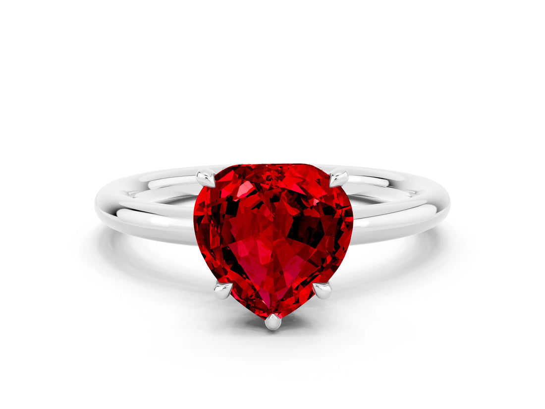 White gold Heart Cut Ruby Solitaire Ring with Thin Band and Four-Prong Setting