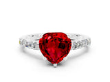 White gold Heart Cut Ruby Solitaire with Side Baguettes and Channel Set Band