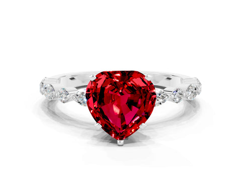 White gold Heart Cut Ruby Solitaire with Side Stones on a Pavé Band and Four-Prong Setting